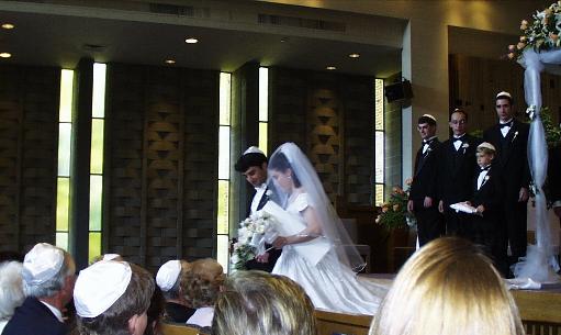 Jodie and Adam leaving the chupah