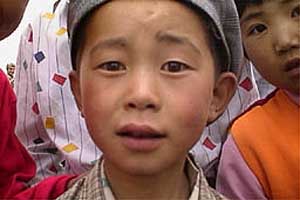 A child in a small mountain village outside of 
Lanzhou