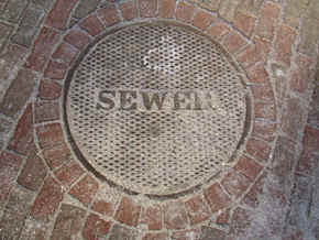 Brookline Sewer Cover with Bricks