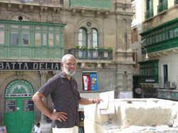 Haybert Houston in front of buildings in Malta