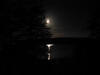 Almost full moon reflecting on lake; viewed from our deck