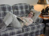 Nancy taking a break from reading a mystery novel