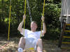 Ken enjoying the swings