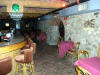 Speakeasy pub called "The Cave" where there is nightly entertainment