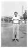 My dad in front of sub station (I think) where his father worked. Taken in 1942.