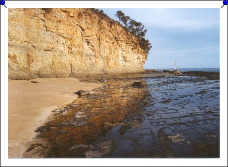 Pebbly Beach - rocks reflection