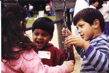 On the swing at the Alliance picnic