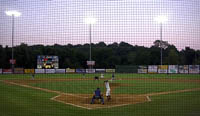 Baseball under the darkening sky