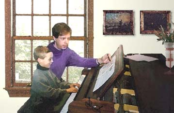 kevin and student at the piano